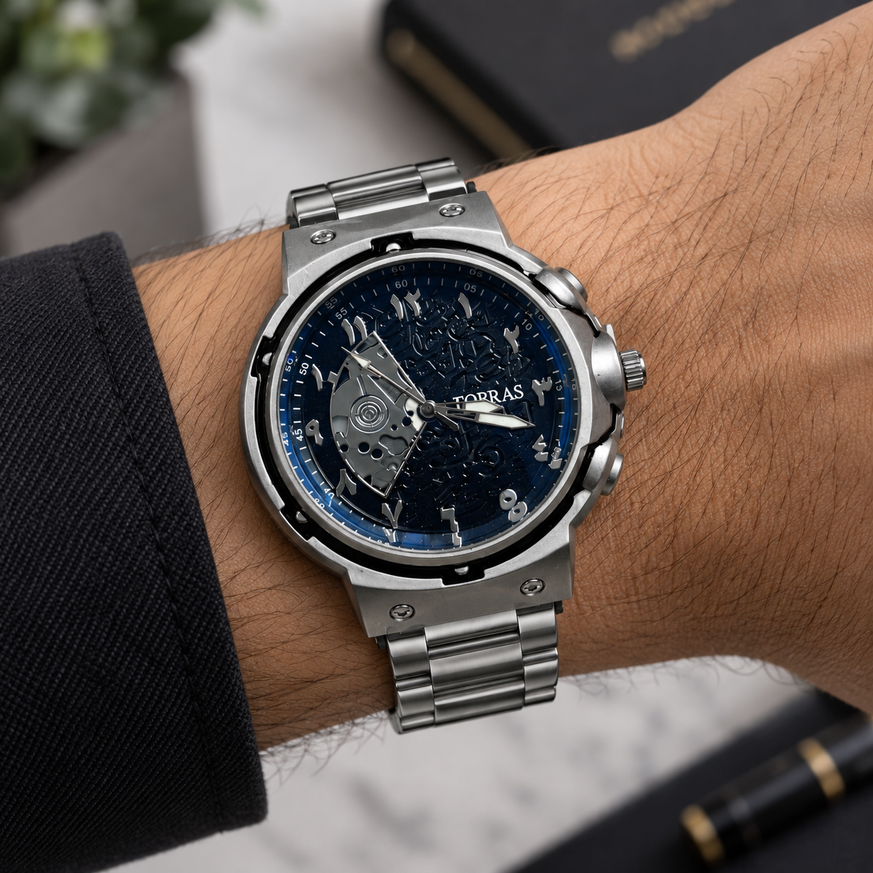 FOBRAS Men's Silver Blue Skeleton Dial Chronograph Style Analog Watch